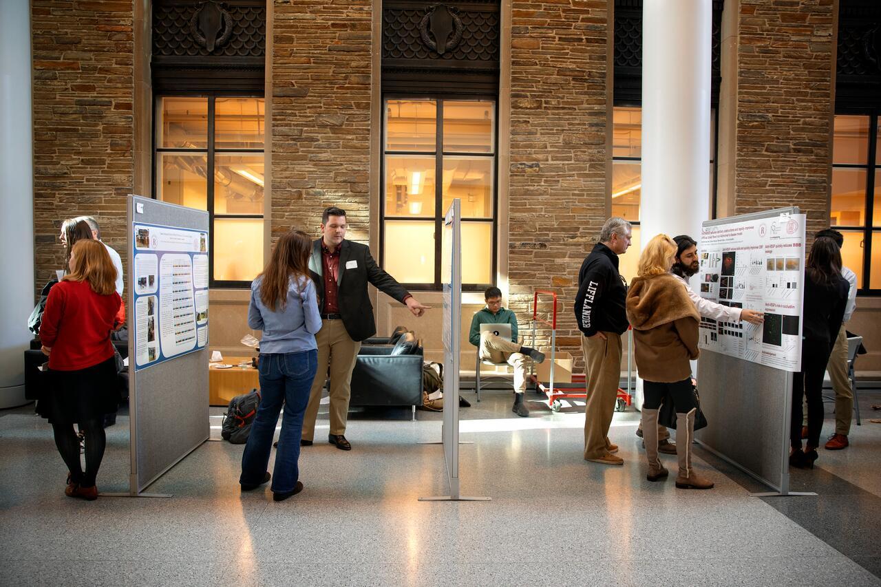 Members of the class of 2019 Rawlings Cornell Presidential Research Scholars (RCPRS) present posters outlining the research they've been doing for the last few years, in Baker Portico in the Physical Sciences Building.